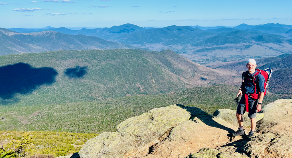 Brian, in front of the eastern view from Mt. Lincoln